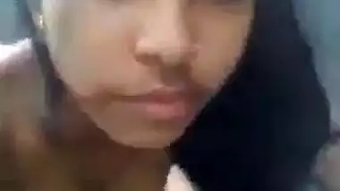 Young village girl showing