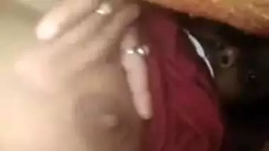 Lecherous Desi gal demonstrating her tits online under the blanket