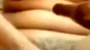 Desi whore strips and actively XXX drills her twat with long dildo