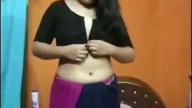 Cute girl stripping saree and showing naked boobs