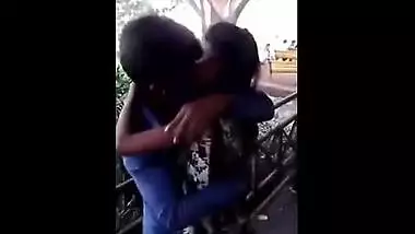 College couples enjoying a romantic kiss at the lovers point