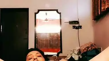 Desi Bhabhi inserting apple inside her pussy