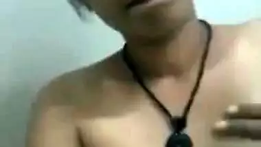 Female shows off her sex titties and rubs XXX clitoris in the corner